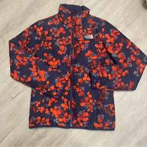 The North Face Women's Puffer Jacket - Navy and Red Floral